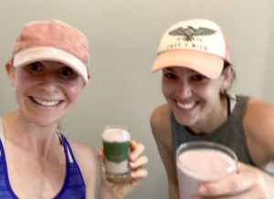 Two girls enjoying the Kale Me Crazy Recovery Smoothie