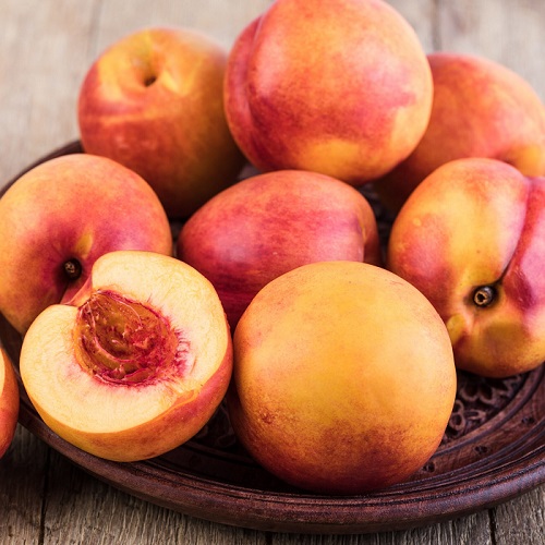 nectarines in a bowl as a low calorie fruit and healthy snack